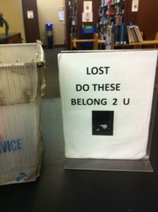 Photo of sign in Perkins Library for lost and found