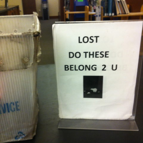 Photo of sign in Perkins Library for lost and found